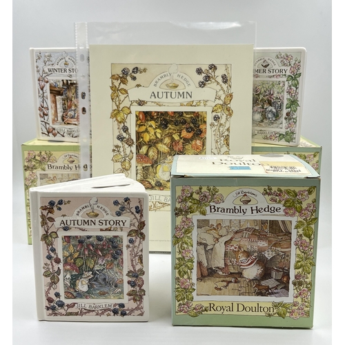 284 - Four boxed Royal Doulton Brambly Hedge Savings Book money boxes and signed limited edition prints to... 