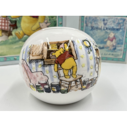 286 - Four items of Royal Doulton The Winnie-the-Pooh Collection china to include three piece children's s... 