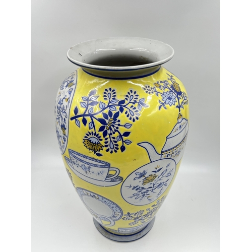 287 - An Oriental yellow glazed porcelain vase depicting blue and white china - approx. 35cm high