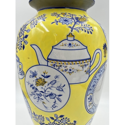 287 - An Oriental yellow glazed porcelain vase depicting blue and white china - approx. 35cm high