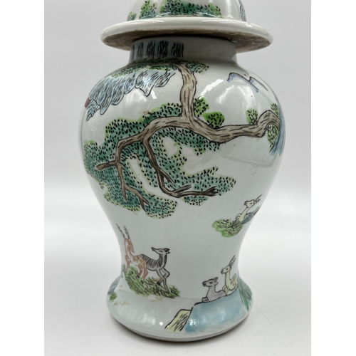 287A - A Chinese Famille Verte porcelain ginger jar and cover - approx. 23cm high