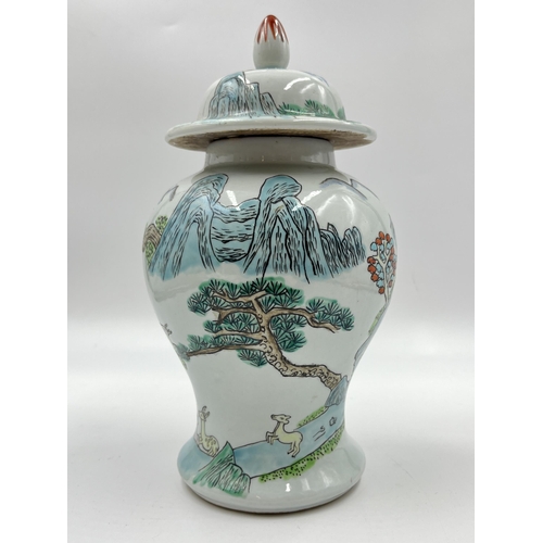 287A - A Chinese Famille Verte porcelain ginger jar and cover - approx. 23cm high