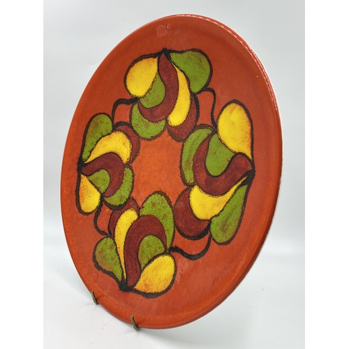 290 - A Poole Pottery Delphis pattern charger - approx. 35cm diameter