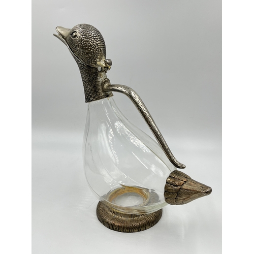 295 - A silver plate and glass duck decanter - approx. 27cm high