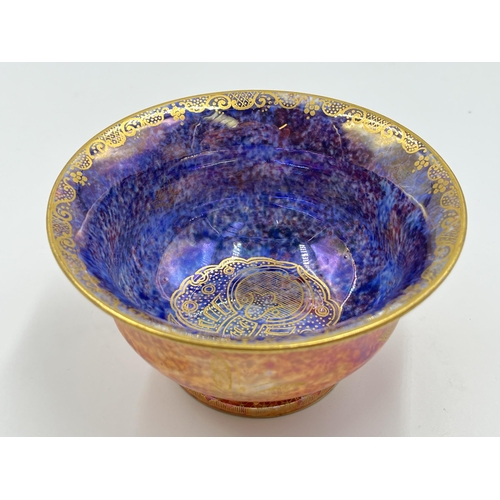 303 - A 1920s Wedgwood Fairyland Lustre bowl with butterfly design, no. Z4825 - approx. 11.5cm diameter