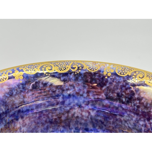 303 - A 1920s Wedgwood Fairyland Lustre bowl with butterfly design, no. Z4825 - approx. 11.5cm diameter