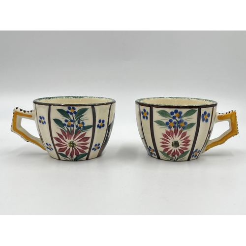 305 - Two Quimper hand painted pottery tea cups - ref no. 222