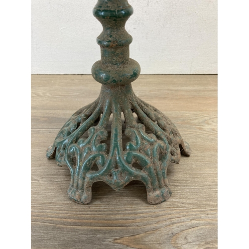 364 - A cast iron scalloped shaped bird bath on pedestal base - approx. 49cm high x 39cm wide