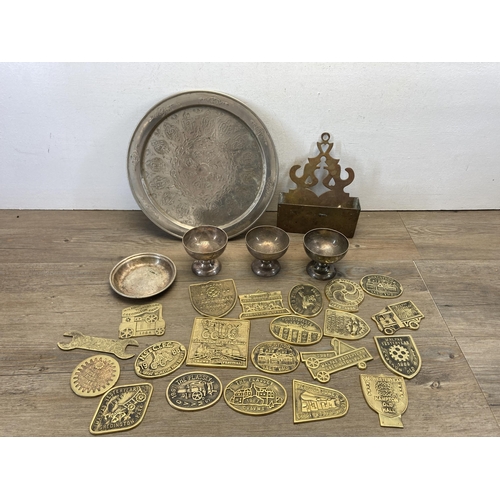 373 - A collection of metalware to include middle eastern serving dish, four pieces of early 20th century ... 