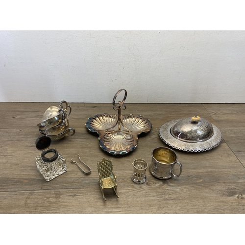 375 - A collection of metalware to include brass miniature rocking chair, boxed Viners silver plated wine ... 