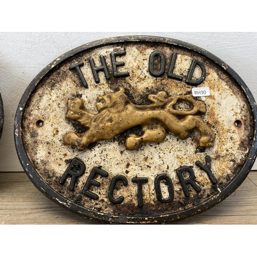 376 - A pair of vintage 'The Old Rectory' cast iron wall plaques