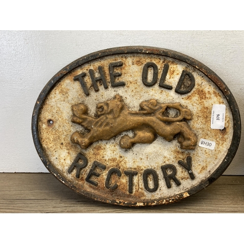 376 - A pair of vintage 'The Old Rectory' cast iron wall plaques