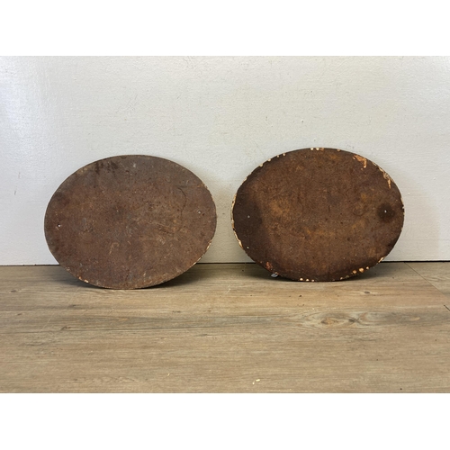 376 - A pair of vintage 'The Old Rectory' cast iron wall plaques