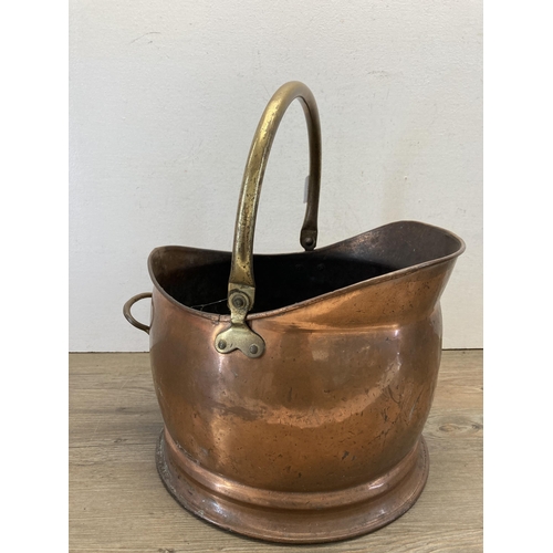 384 - A 19th century copper and brass coal scuttle - approx. 44cm high