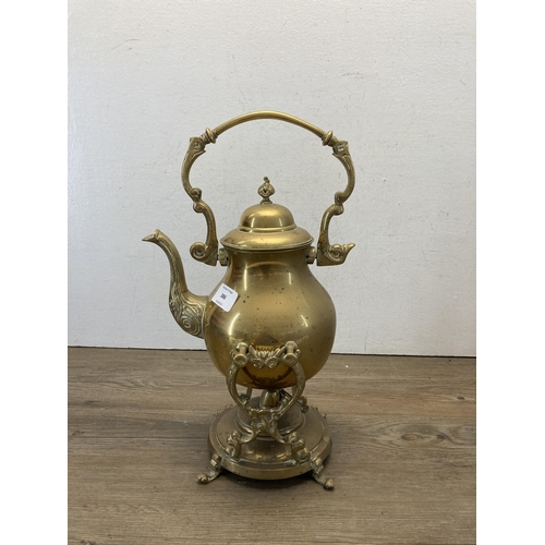 386 - A late 19th/early 20th century brass spirit kettle on stand - approx. 40cm