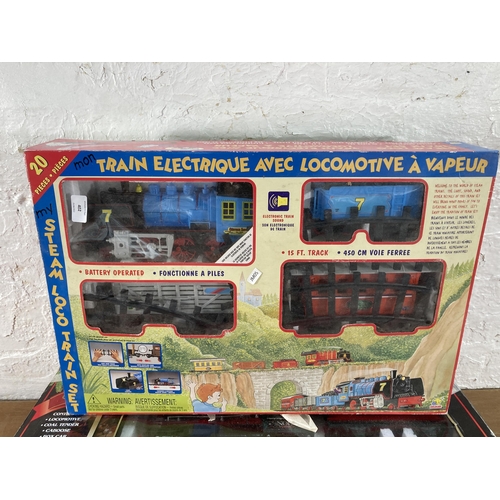 402 - Two boxed model railway sets, one Goldlok and one Eztec Santa Express