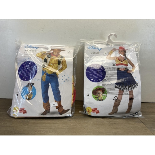 406 - Two Rubie's Disney Toy Story costumes, one Woody and one Jessie