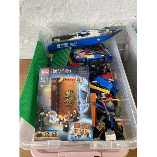 407 - Four boxes containing a large collection of assorted Lego