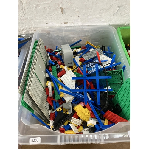 407 - Four boxes containing a large collection of assorted Lego