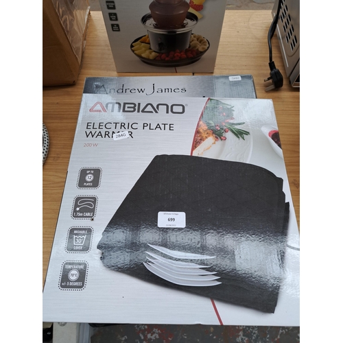 699 - Four boxed items, one Andrew James induction hob, one Ambiano electric plate warmer, one Ambiano cho... 