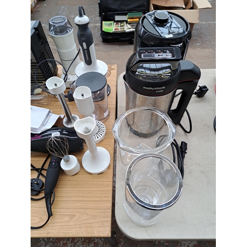 701 - A collection of electrical items to include Kenwood hand blender with attachments, Maestrowave insec... 