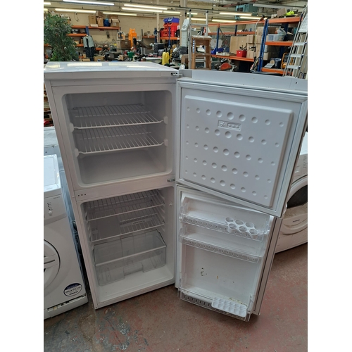 711 - A Beko upright fridge freezer - approx. 137cm high