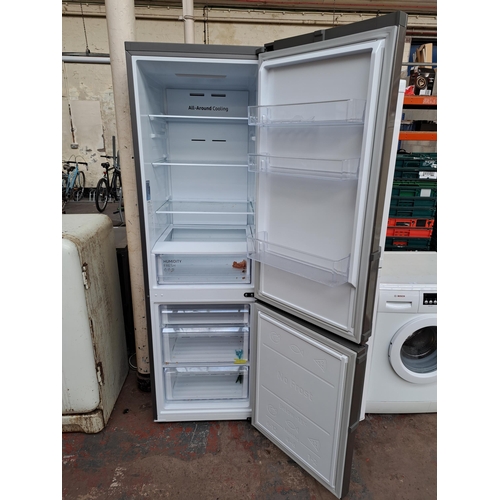 721 - A Samsung upright fridge freezer - approx. 192cm high - please see condition report