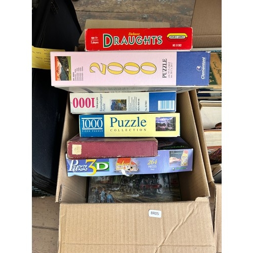 950 - Four boxes and two vintage travel cases containing vintage board games, four vintage Enid Blyton boo... 