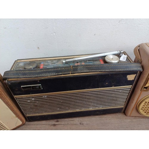 578 - Eight vintage portable radios to include Roberts R600, Nordmende etc.