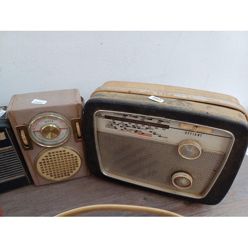 578 - Eight vintage portable radios to include Roberts R600, Nordmende etc.