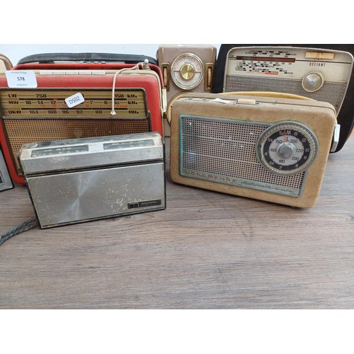 578 - Eight vintage portable radios to include Roberts R600, Nordmende etc.