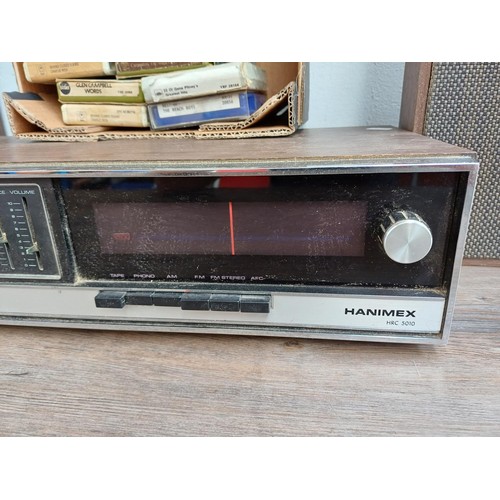 586 - A vintage Japanese Hanimex HRC5010 eight-track tape machine/two band receiver with a pair of matchin... 