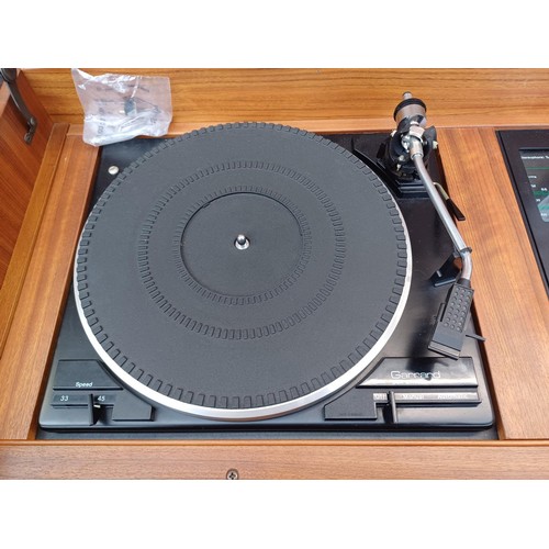 595 - A late 1970s Dynatron GC1412PW desk style music centre comprising Garrard two-speed turntable, SRX20... 