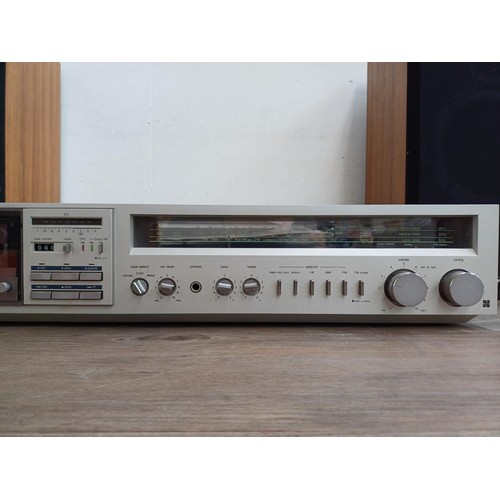 597 - A Panasonic SG-3220 stereo music centre comprising two speed turntable, Dolby cassette deck, three b... 