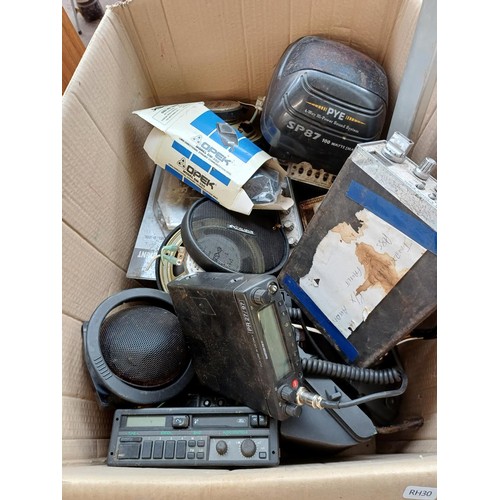 598 - Two boxes containing a large collection of car stereos, CB radios and accessories for spares or repa... 