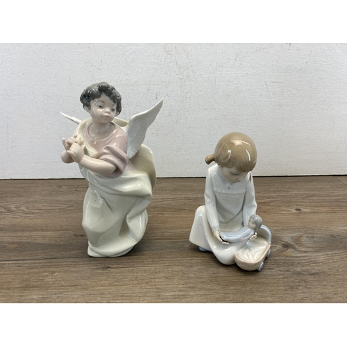 318 - Eight pieces of ceramics and glassware to include Lladro no. 5494 Angel with Clarinet figurine, Coal... 