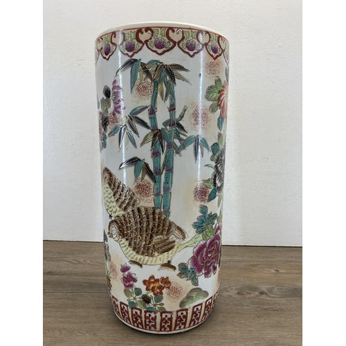 320 - A Chinese hand painted porcelain stick stand - approx. 37cm high