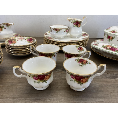 333 - A collection of Royal Albert Old Country Roses bone china to include four tea cups, sugar bowl, milk... 