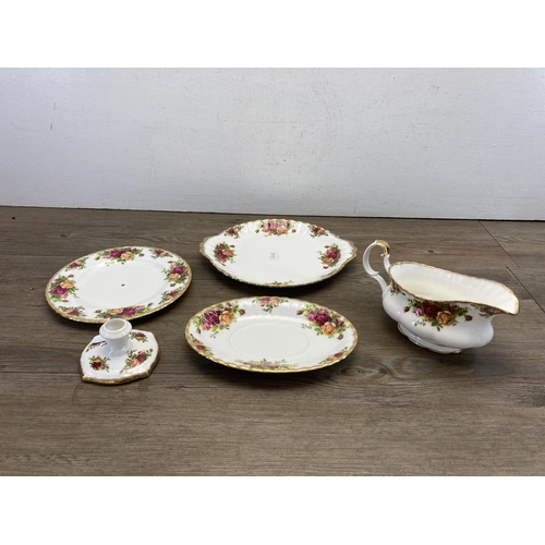 333 - A collection of Royal Albert Old Country Roses bone china to include four tea cups, sugar bowl, milk... 