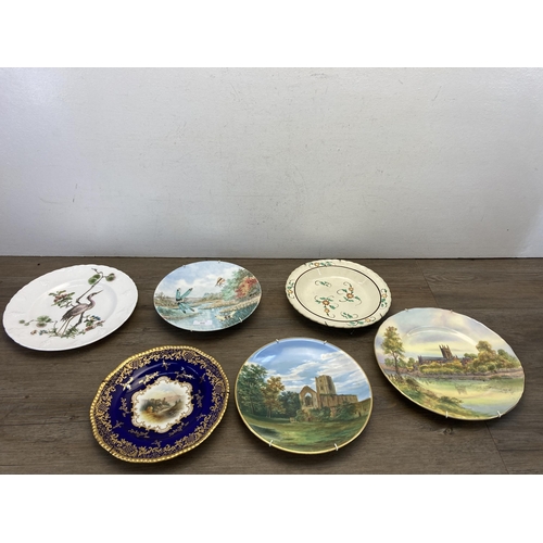 352 - A collection of 19th century and later ceramics and glassware to include two hand painted opaque gla... 