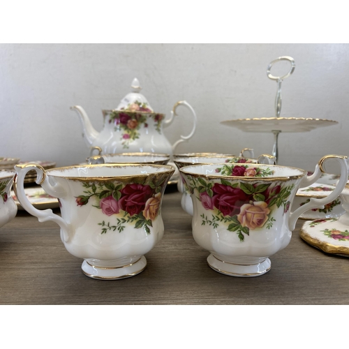 355 - A collection of Royal Albert Old Country Roses bone china to include pair of candlesticks, two tier ... 