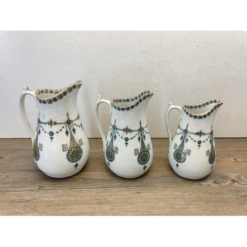 357 - Five pieces of late 19th/early 20th century pottery, three Lyons graduating jugs and two salt glazed... 