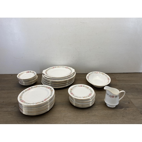 359 - A collection of Paragon Belinda dinnerware to include coffee pot, dinner plates, coffee cups etc.