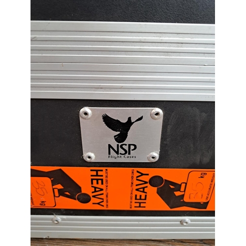 637 - An NSP foam lined flight case - approx. 73cm x 60cm x 30cm