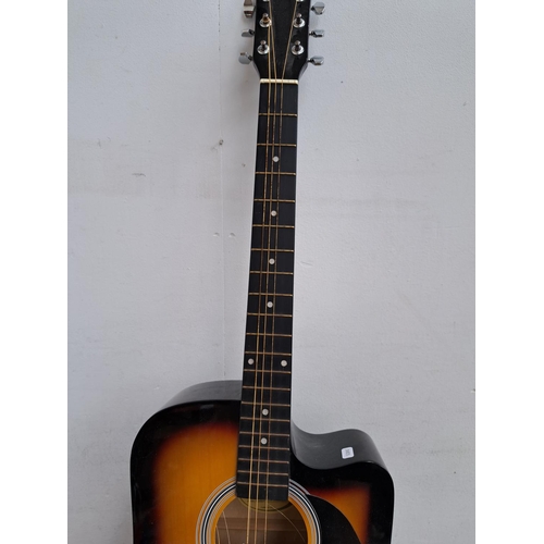 643 - A Squier SA-105CE steel strung Dreadnought electro acoustic guitar with a set of Martin .012 phospho... 