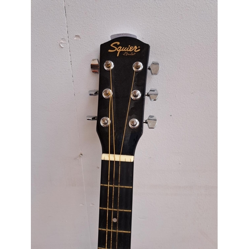 643 - A Squier SA-105CE steel strung Dreadnought electro acoustic guitar with a set of Martin .012 phospho... 