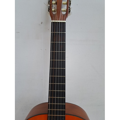 644 - A hard cased Epiphone C25 nylon strung full size classical guitar