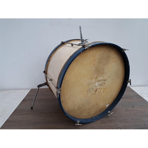 650 - A collection of vintage drum kit drums and percussion accessories to include wooden rimmed bass drum... 