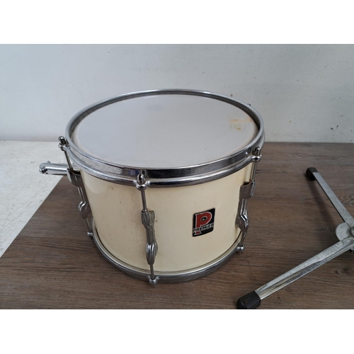 650 - A collection of vintage drum kit drums and percussion accessories to include wooden rimmed bass drum... 