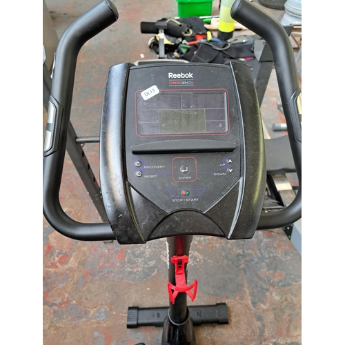 758 - A Reebok one GB40S exercise bike with digital read out